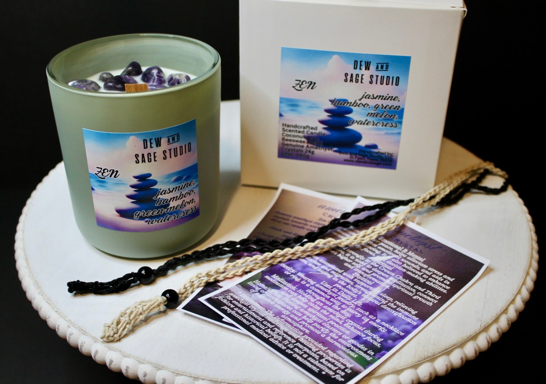 Hand-poured Zen candle in matte sage jar with wood wick and amethyst crystals, rope necklace holder for amethyst and candle care card and crystal care card.
